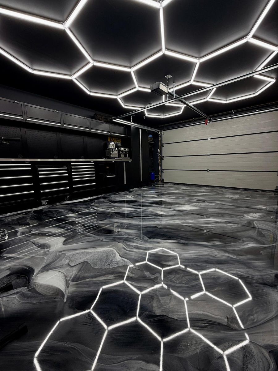 Black Metallic Garage, garage · metallic resin floor by Atelier Resin