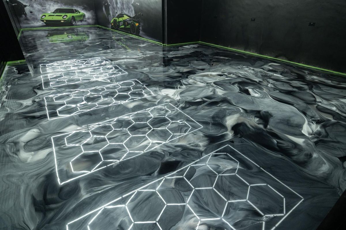 Automotive Showroom, commercial · faux marble resin floor by Atelier Resin