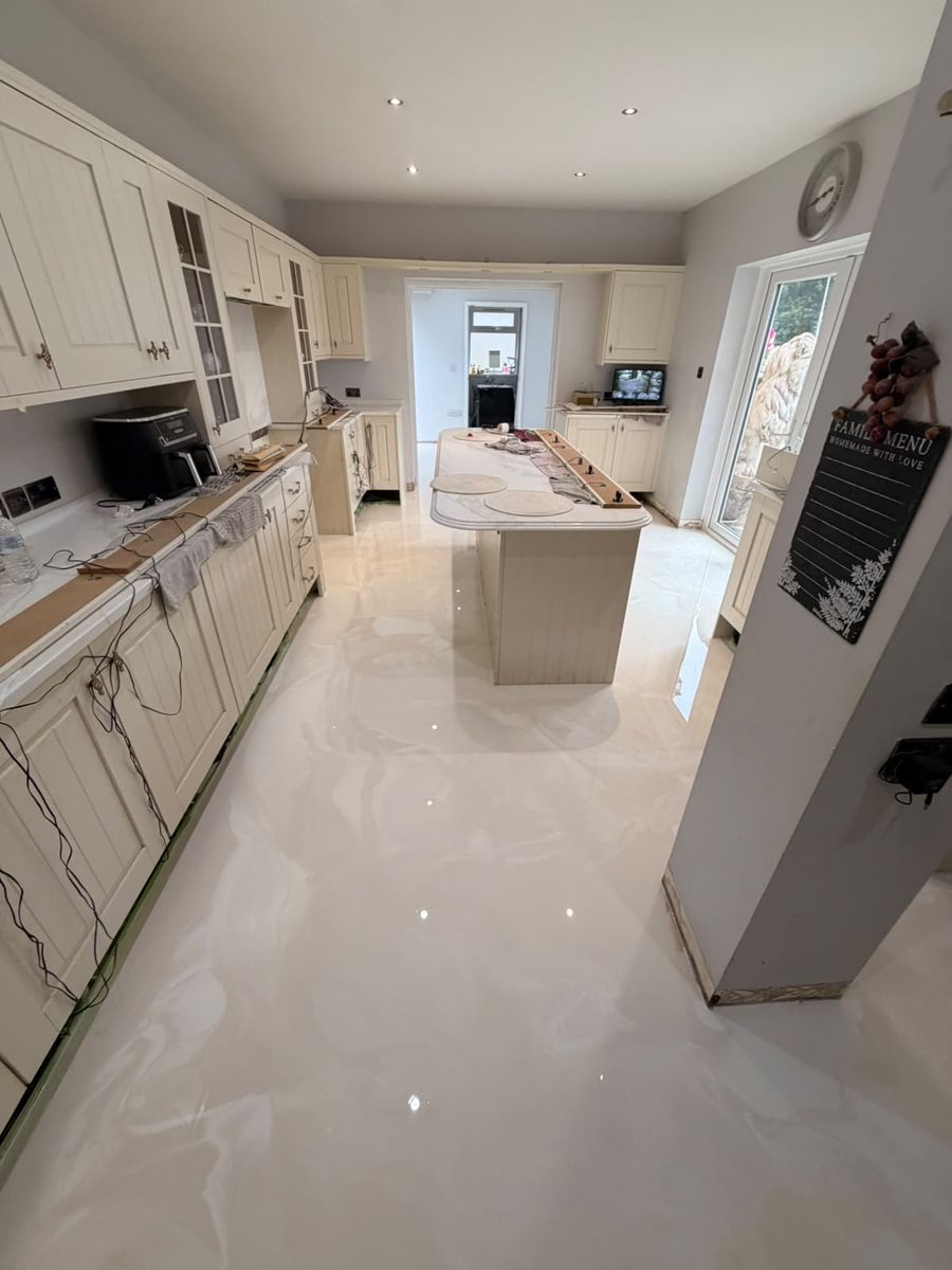 Pearl metallic poured resin kitchen floor with island