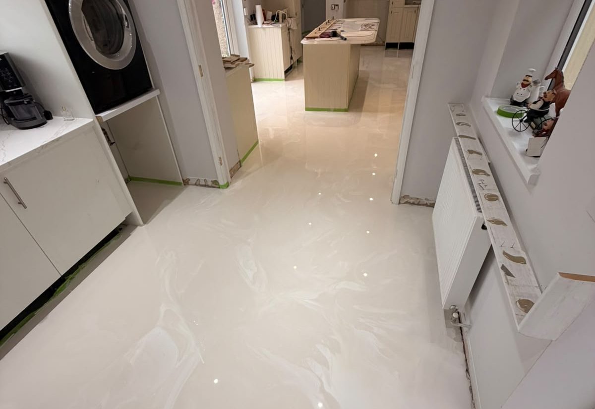 Finished poured resin kitchen floor